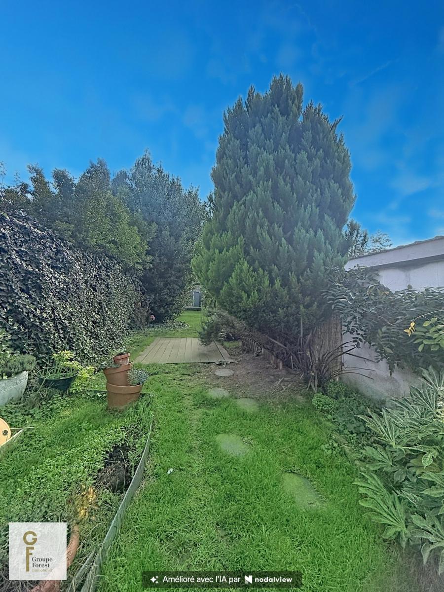 DEMEURE BOURGEOISE AVEC JARDIN À BARBIEUX