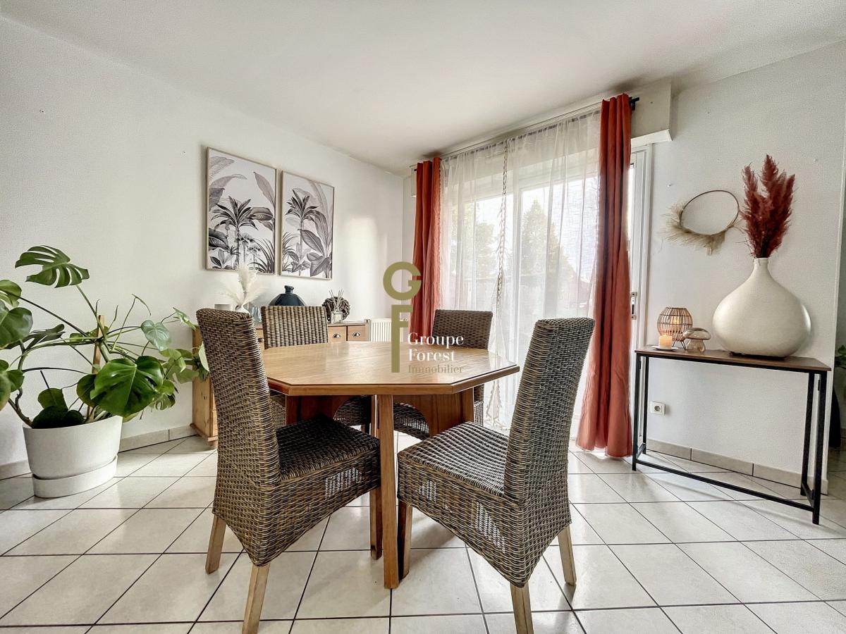 A vendre maison louée avec 3 chambres, un garage et une place de parking